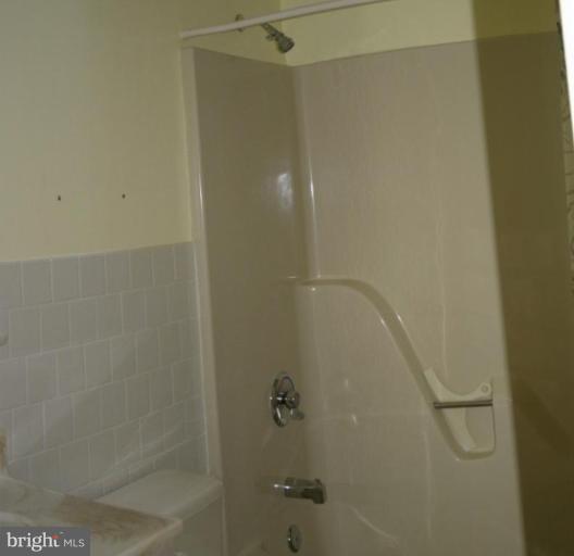 1400 Woodwell Road Silver Spring, MD 20906 - Photo 18 of 20 a bathroom with a shower
