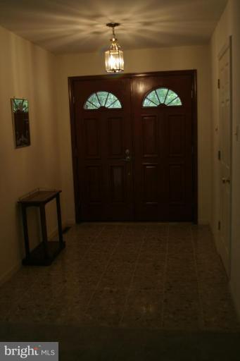 1400 Woodwell Road Silver Spring, MD 20906 - Photo 3 of 20 a view of a hallway