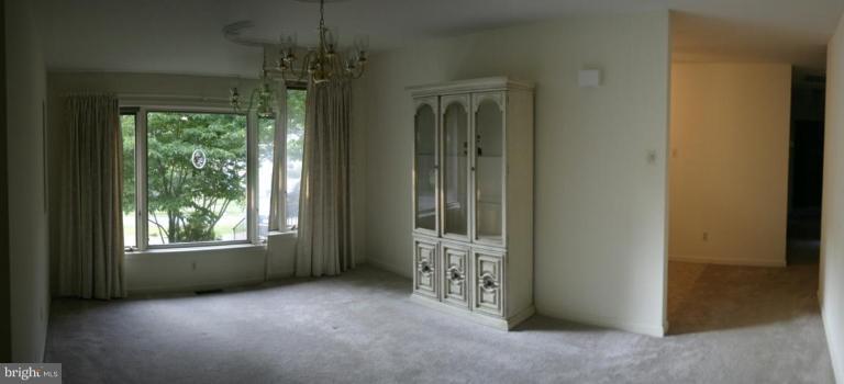 1400 Woodwell Road Silver Spring, MD 20906 - Photo 5 of 20 an empty room with windows and outdoor view