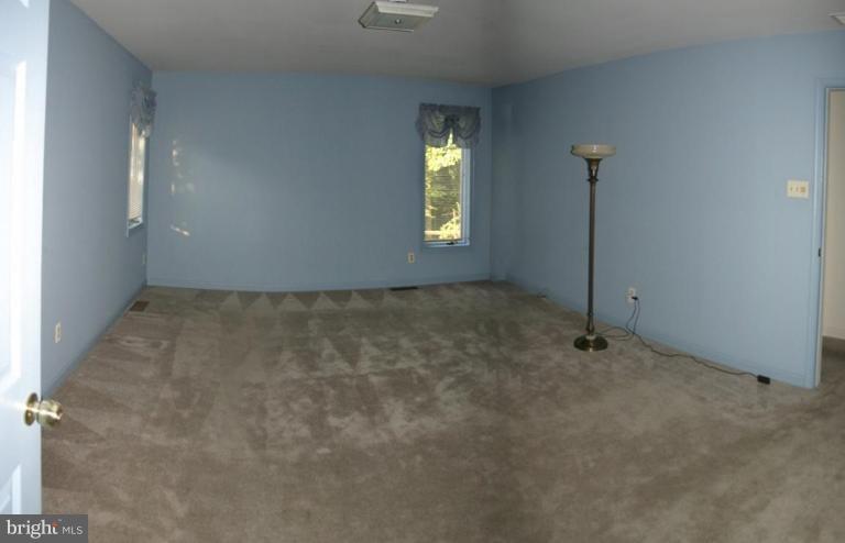 1400 Woodwell Road Silver Spring, MD 20906 - Photo 9 of 20 a view of an empty room with a window