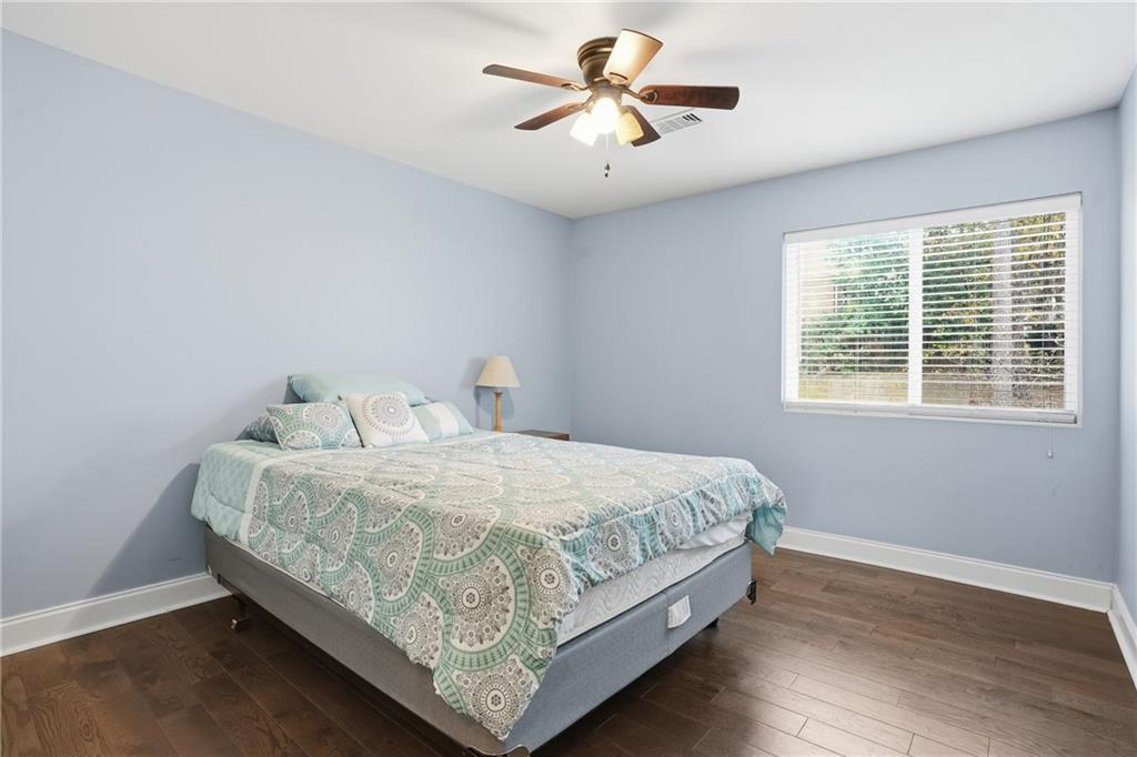 3320 Northcrest Road, Unit C Atlanta, GA 30340 - Photo 12 of 34 a bedroom with bed and a window