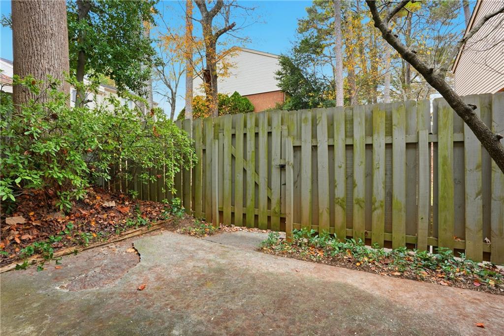 3320 Northcrest Road, Unit C Atlanta, GA 30340 - Photo 25 of 34 a view of a pathway of a building and trees
