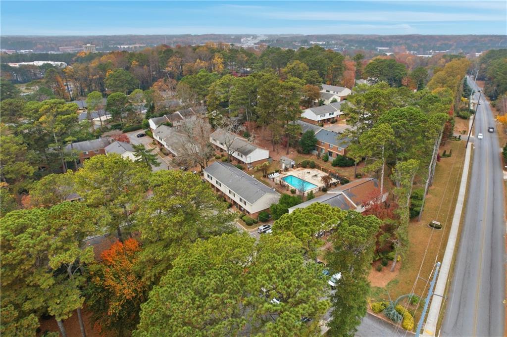 3320 Northcrest Road, Unit C Atlanta, GA 30340 - Photo 26 of 34 an aerial view of residential house with outdoor space and trees all around