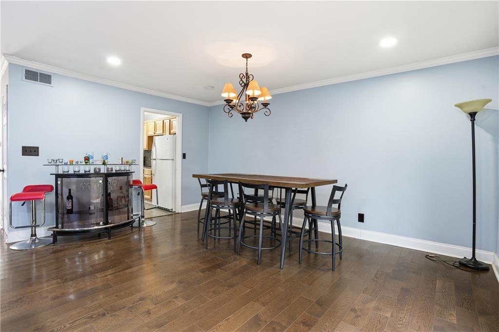3320 Northcrest Road, Unit C Atlanta, GA 30340 - Photo 7 of 34 a dining room with furniture and window