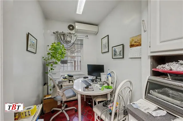 a view of a workspace with furniture