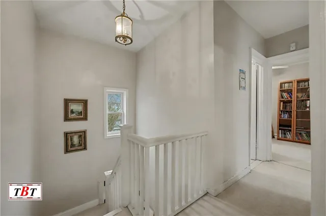 a view of an entryway with chandelier