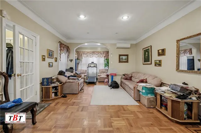 a living room with furniture and a window