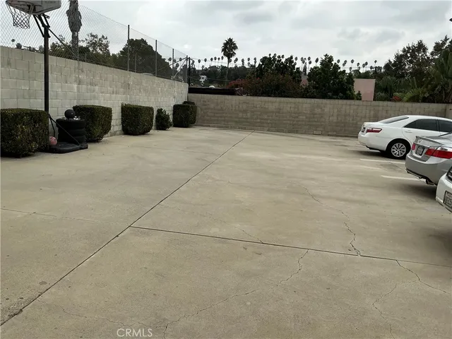 a view of a car parked in front of a house