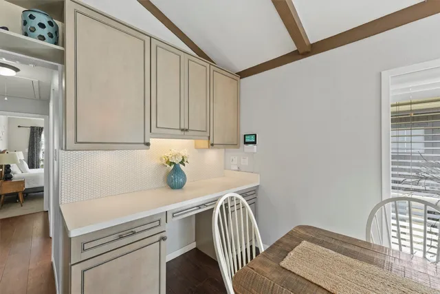 a view of a kitchen from the center