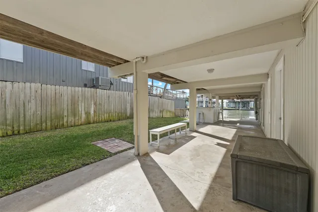 a view of a patio in the backyard