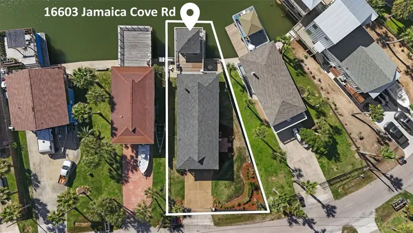 an aerial view of house with yard