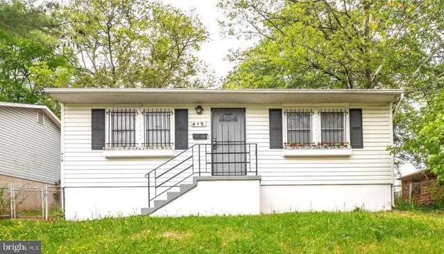 a house view with a garden space