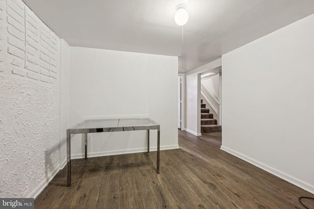 a view of entryway with wooden floor
