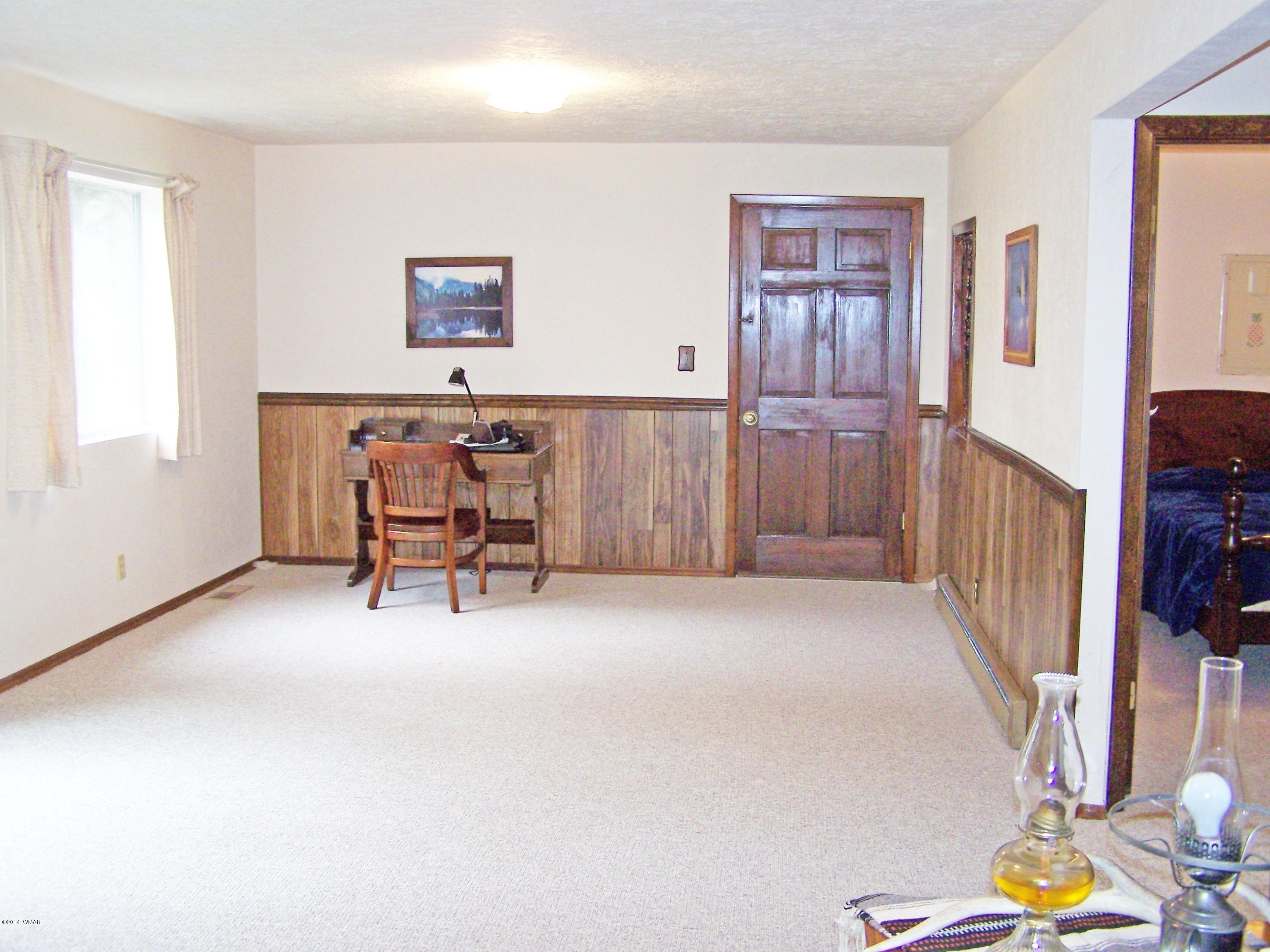 7 County Road 2135 Alpine, AZ 85920 - Photo 13 of 16 a view of a livingroom with furniture and workspace