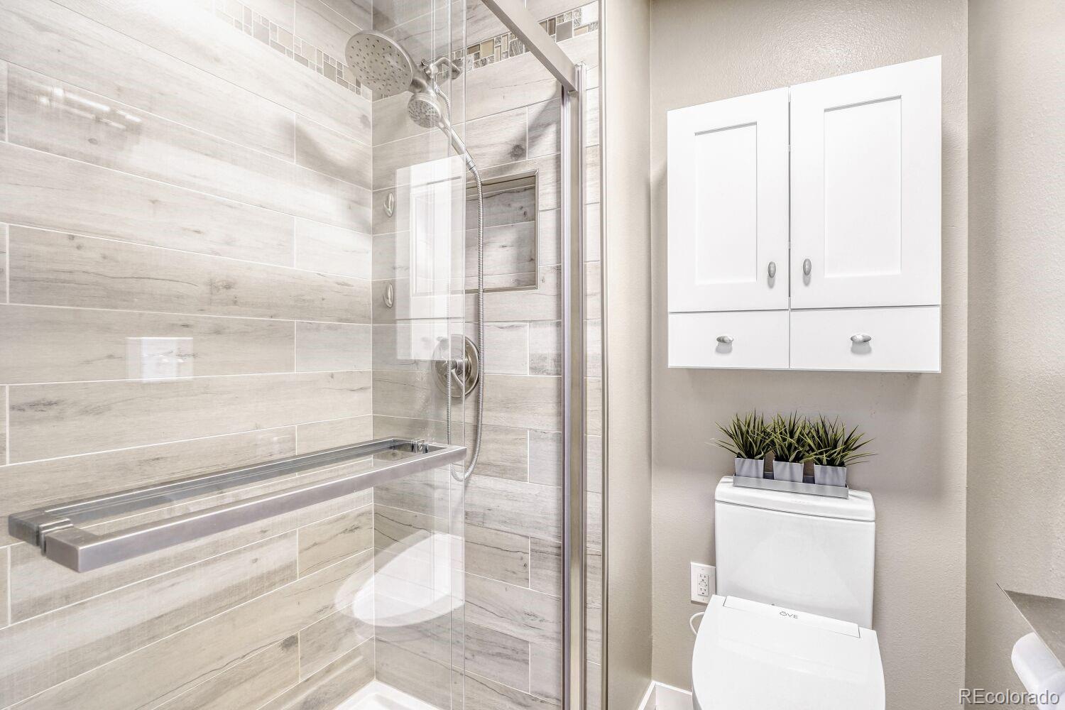 47 Canongate Lane Highlands Ranch, CO 80130 - Photo 16 of 22 a bathroom with a sink and toilet