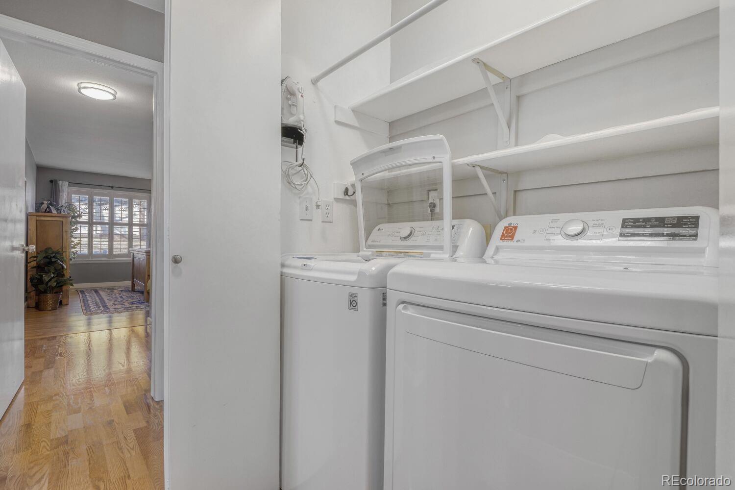 47 Canongate Lane Highlands Ranch, CO 80130 - Photo 19 of 22 a utility room with dryer and washer