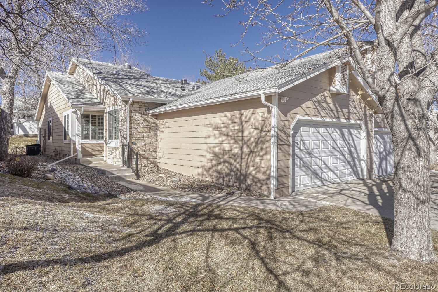 47 Canongate Lane Highlands Ranch, CO 80130 - Photo 2 of 22 a view of a house with a snow
