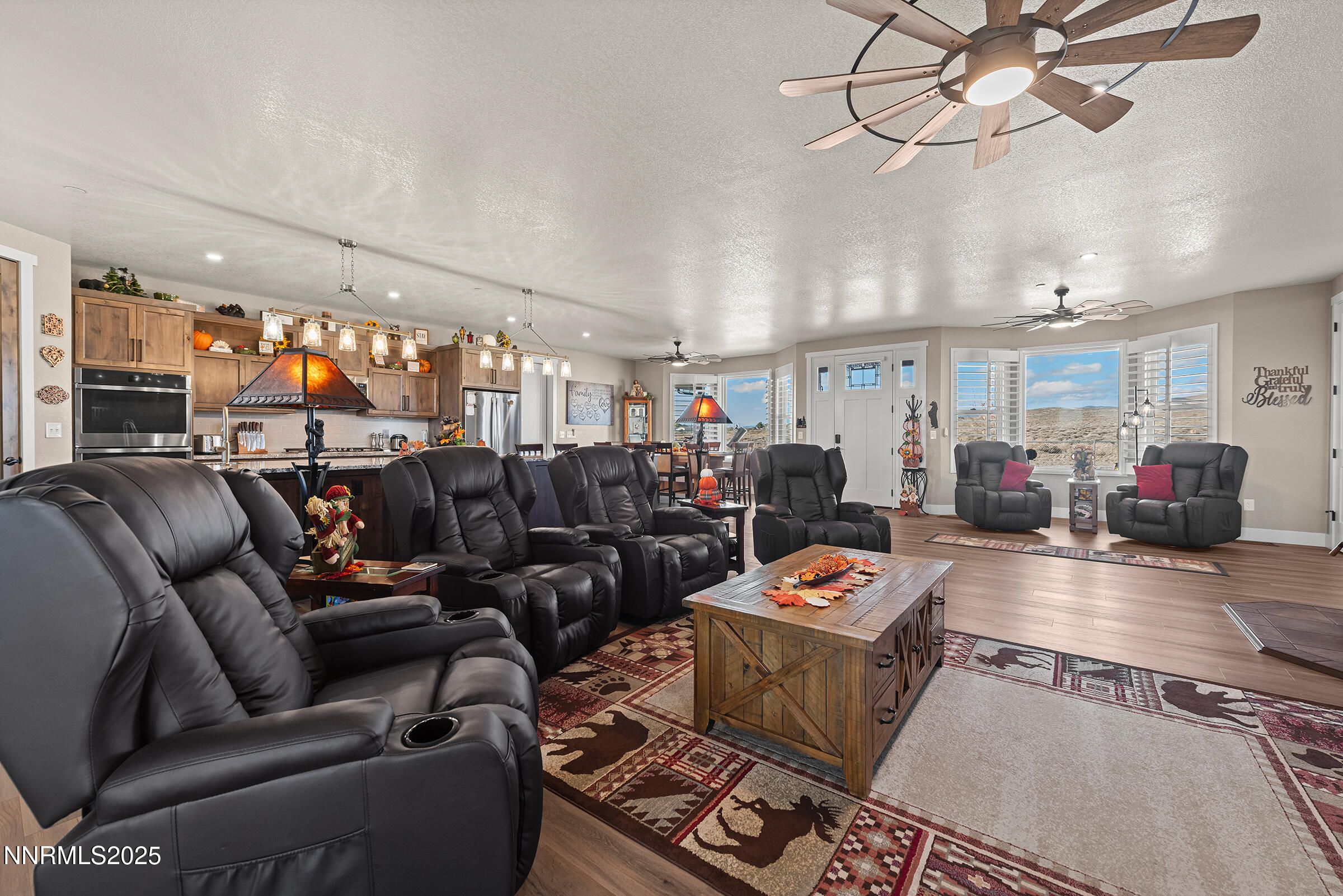 3900 Hackberry Street Silver Springs, NV 89429 - Photo 12 of 30 a living room with furniture and a flat screen tv