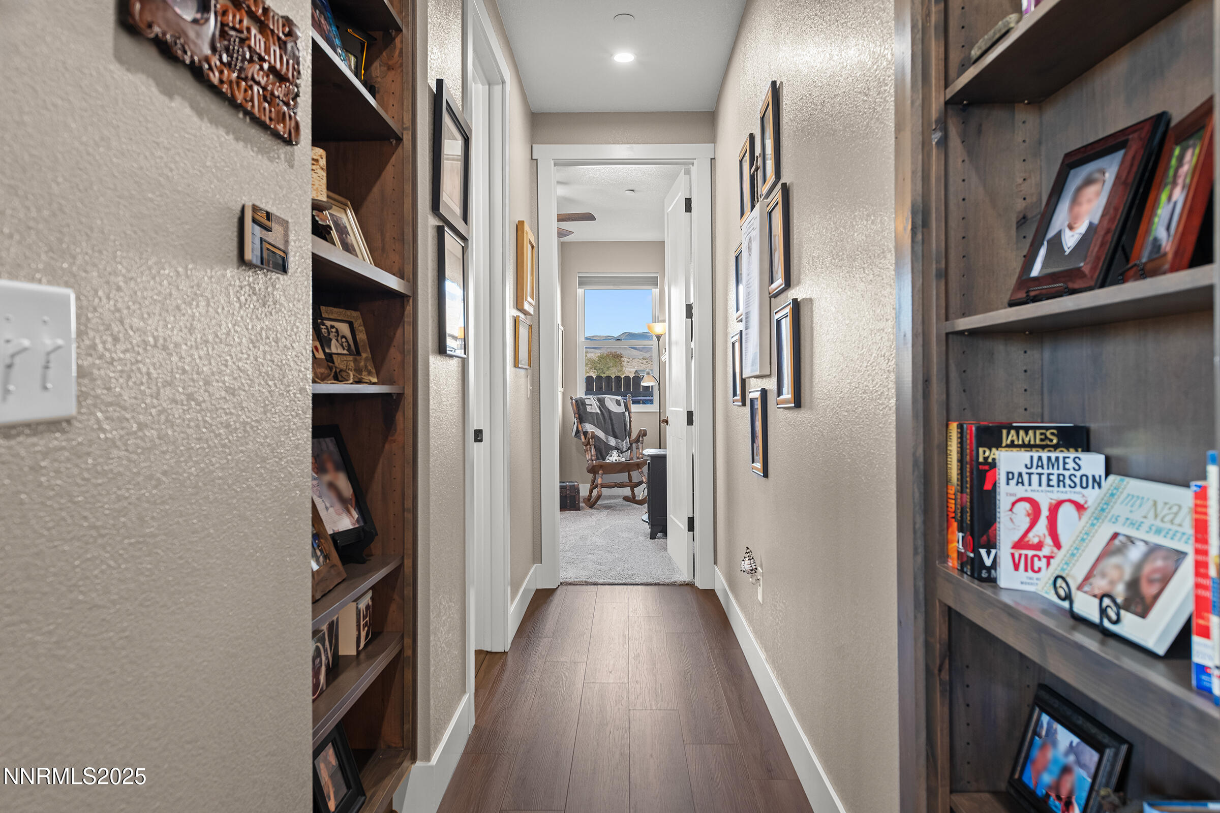 3900 Hackberry Street Silver Springs, NV 89429 - Photo 15 of 30 a view of hallway with stairs and wooden floor