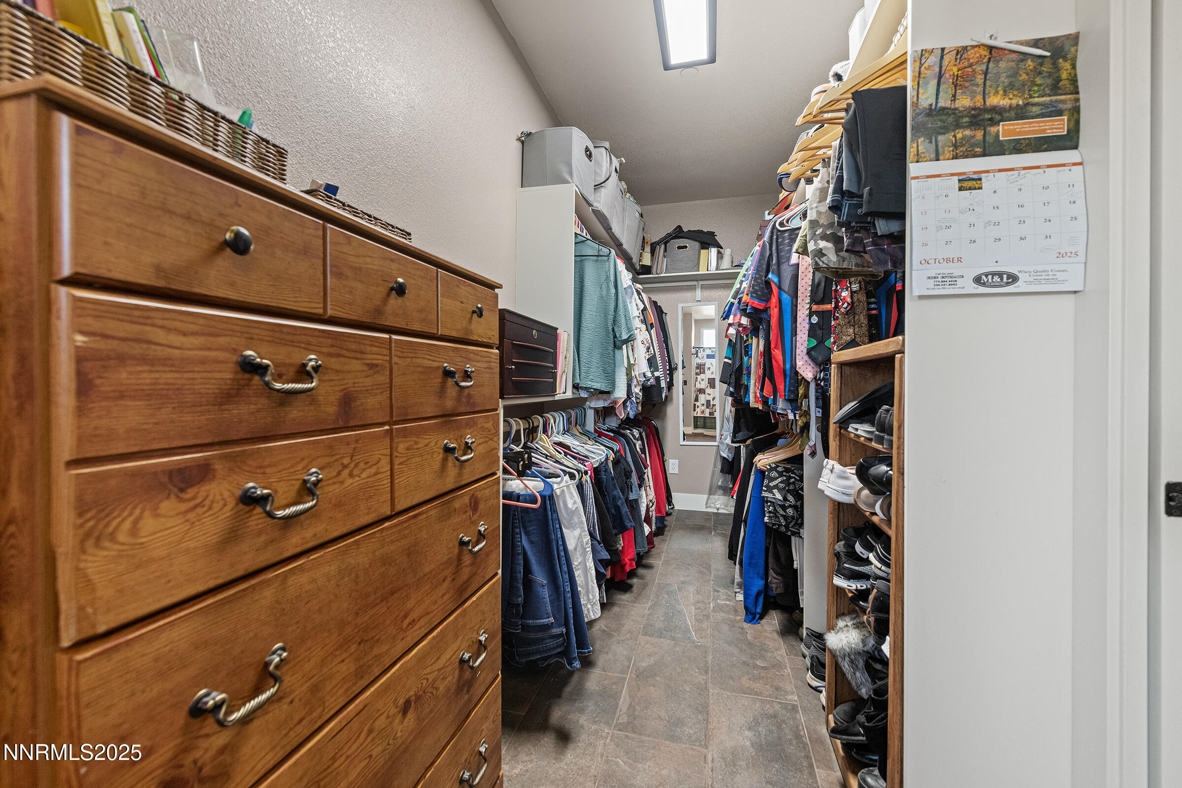 3900 Hackberry Street Silver Springs, NV 89429 - Photo 21 of 30 a view of walk in closet with clothes