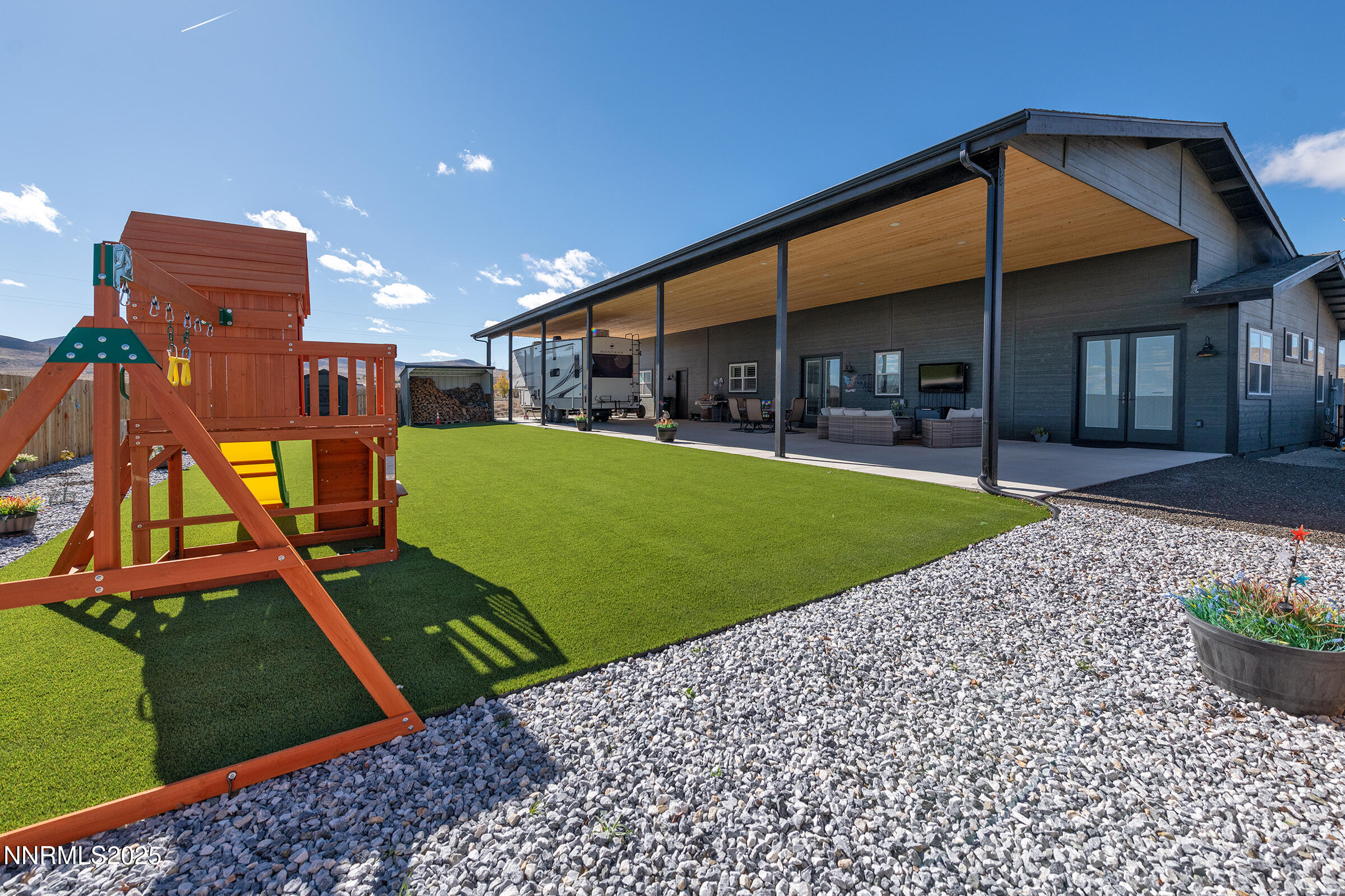 3900 Hackberry Street Silver Springs, NV 89429 - Photo 25 of 30 a view of a house with a yard