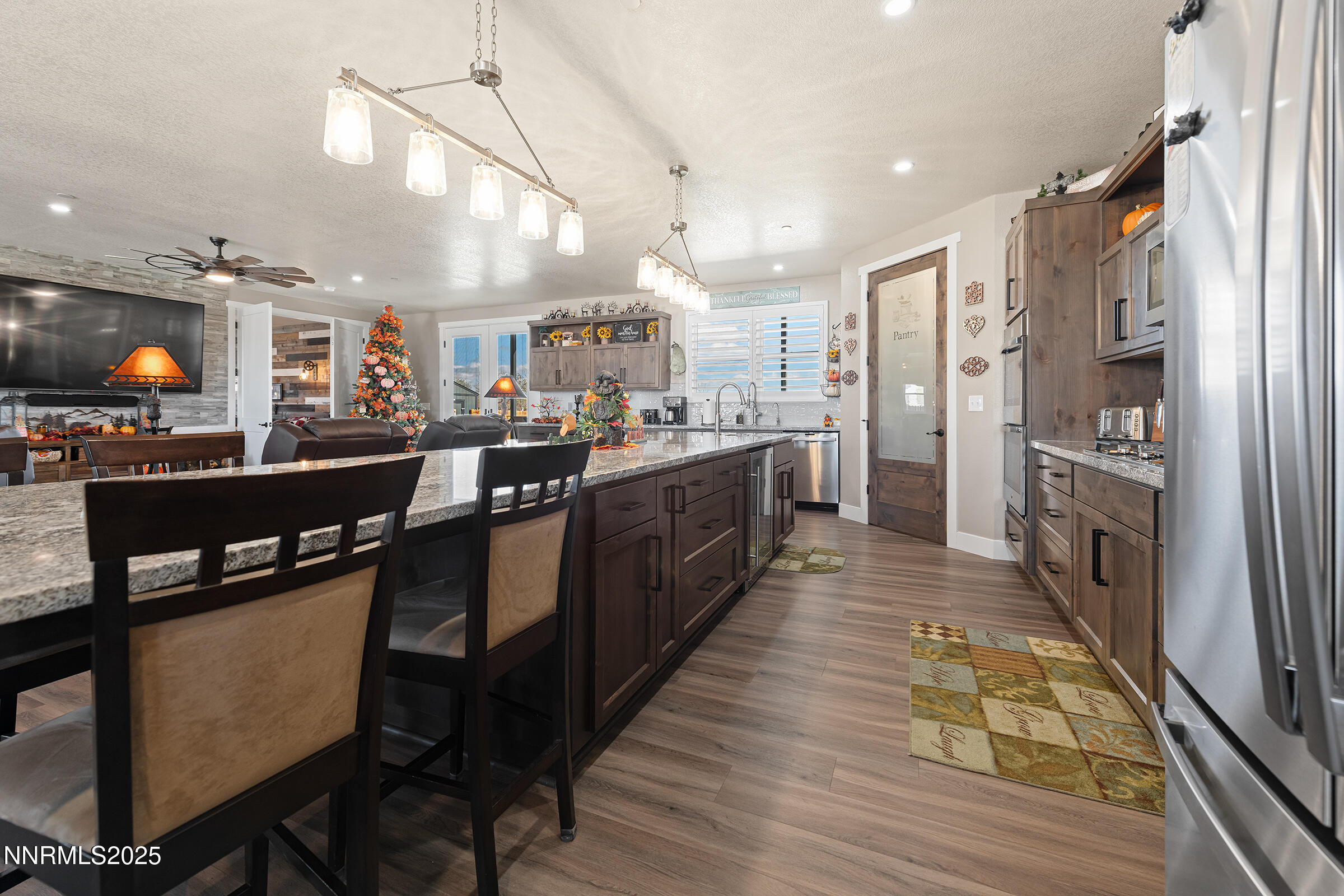 3900 Hackberry Street Silver Springs, NV 89429 - Photo 8 of 30 a large kitchen with lots of counter space and stainless steel appliances