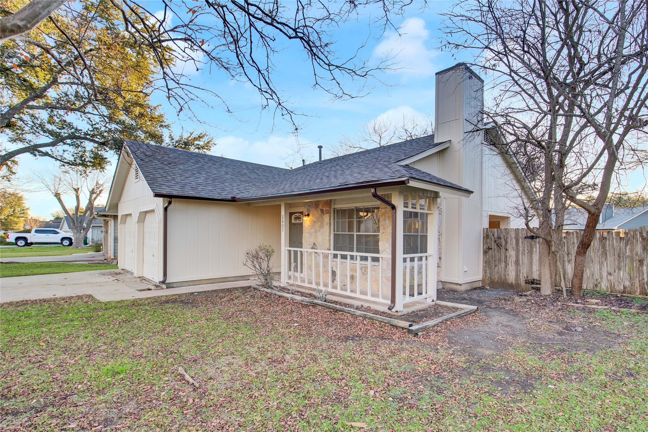 2807 Firecrest Drive Austin, TX 78748 - Photo 24 of 30 a view of a house with a yard and large tree