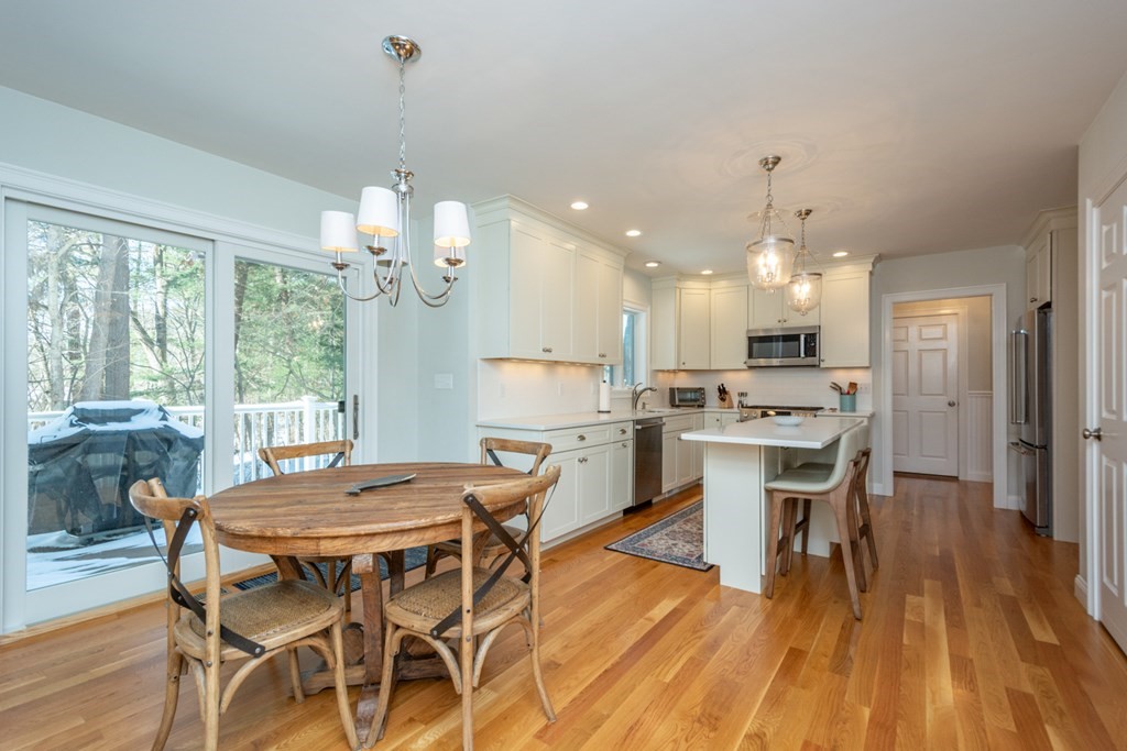 7 July Road Sudbury, MA 01776 - Photo 8 of 41 a view of a dining room with furniture window and wooden floor