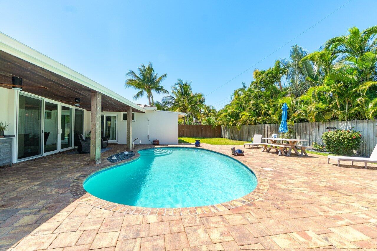 1051 Northwest 3rd Street Boca Raton, FL 33486 - Photo 23 of 31 Pool and backyard