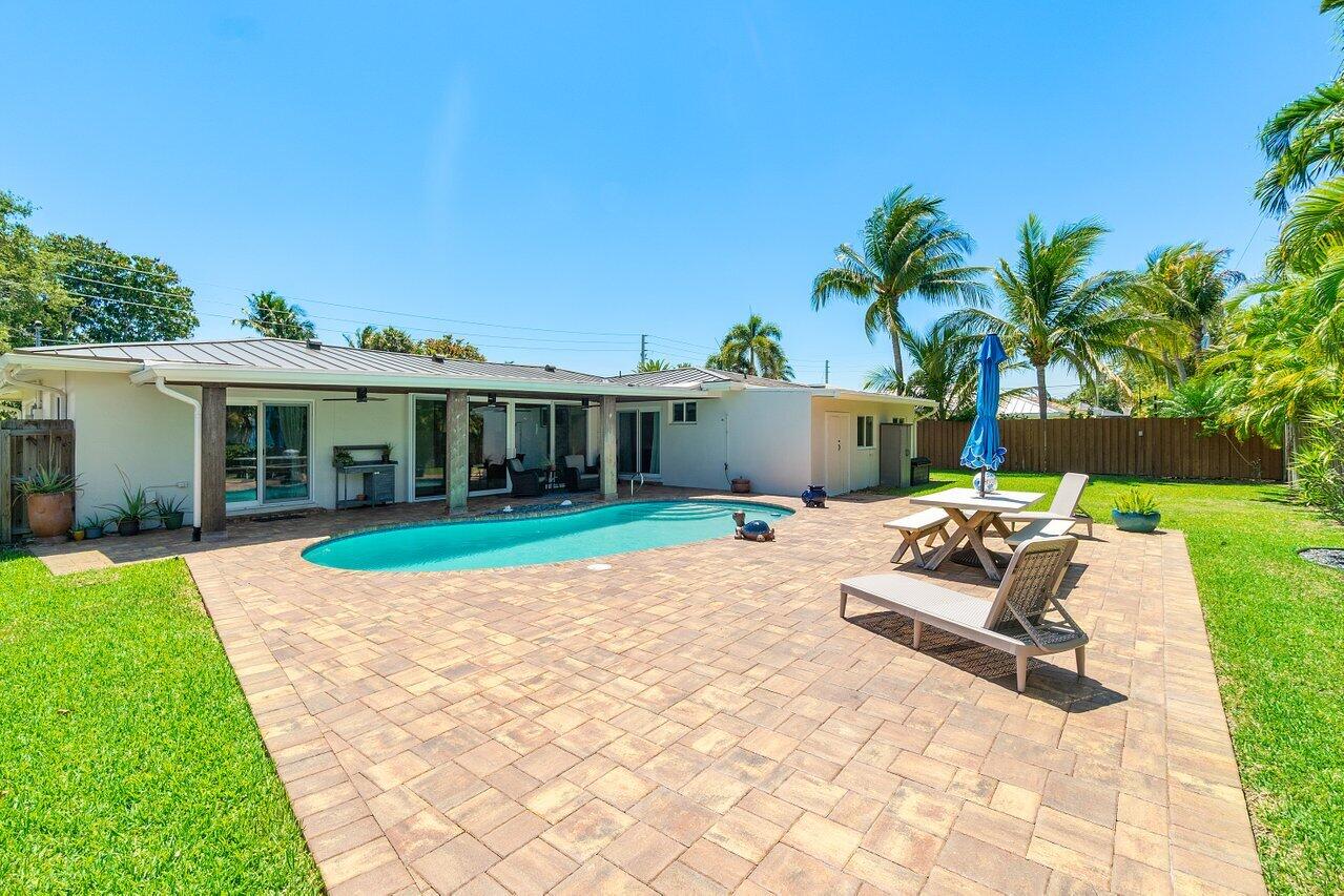 1051 Northwest 3rd Street Boca Raton, FL 33486 - Photo 26 of 31 Pool and backyard