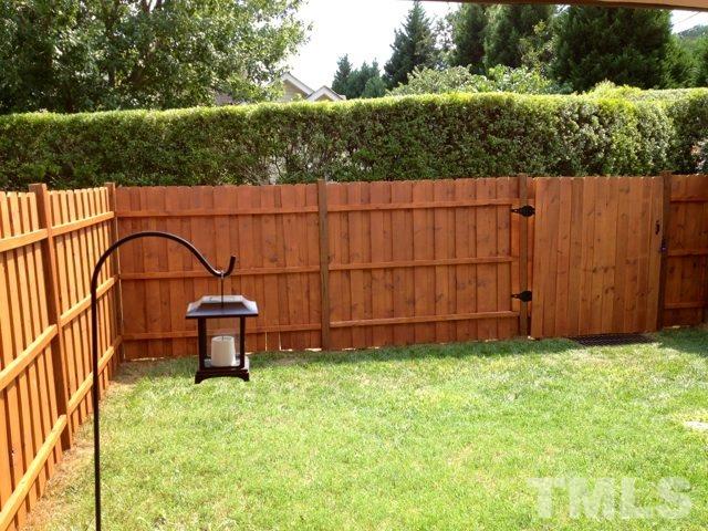 4112 Wyrick Court Raleigh, NC 27604 - Photo 17 of 18 a garden view with a seating space