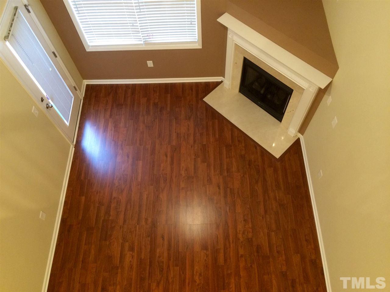 4112 Wyrick Court Raleigh, NC 27604 - Photo 4 of 18 a view of washer and dryer with wooden floor