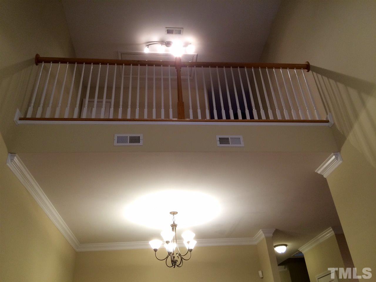 4112 Wyrick Court Raleigh, NC 27604 - Photo 7 of 18 a view of hall with wooden floor