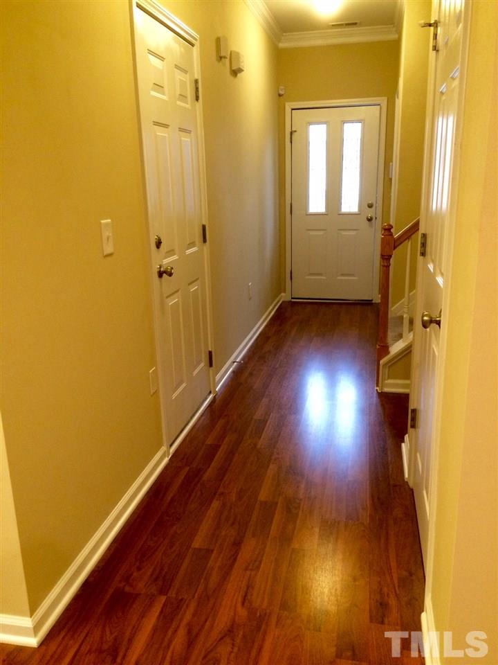 4112 Wyrick Court Raleigh, NC 27604 - Photo 8 of 18 a view of hallway with wooden floor