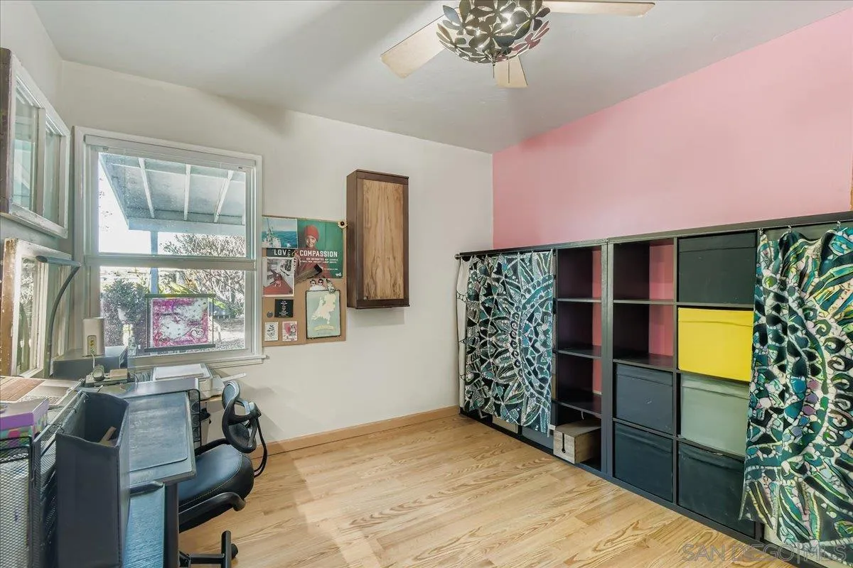 3275 East Virgo Road San Diego, CA 92105 - Photo 12 of 38 a room with window closet and potted plants