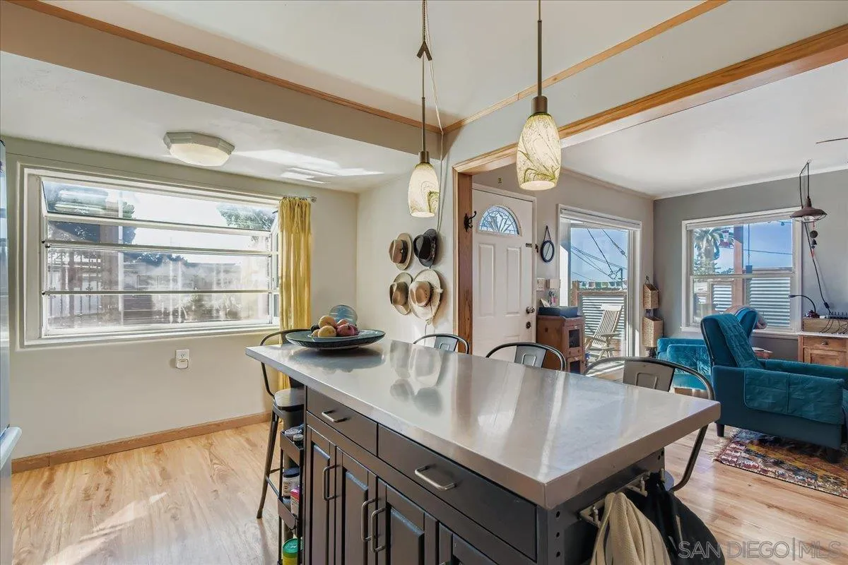 3275 East Virgo Road San Diego, CA 92105 - Photo 10 of 38 a kitchen with sink cabinets and window