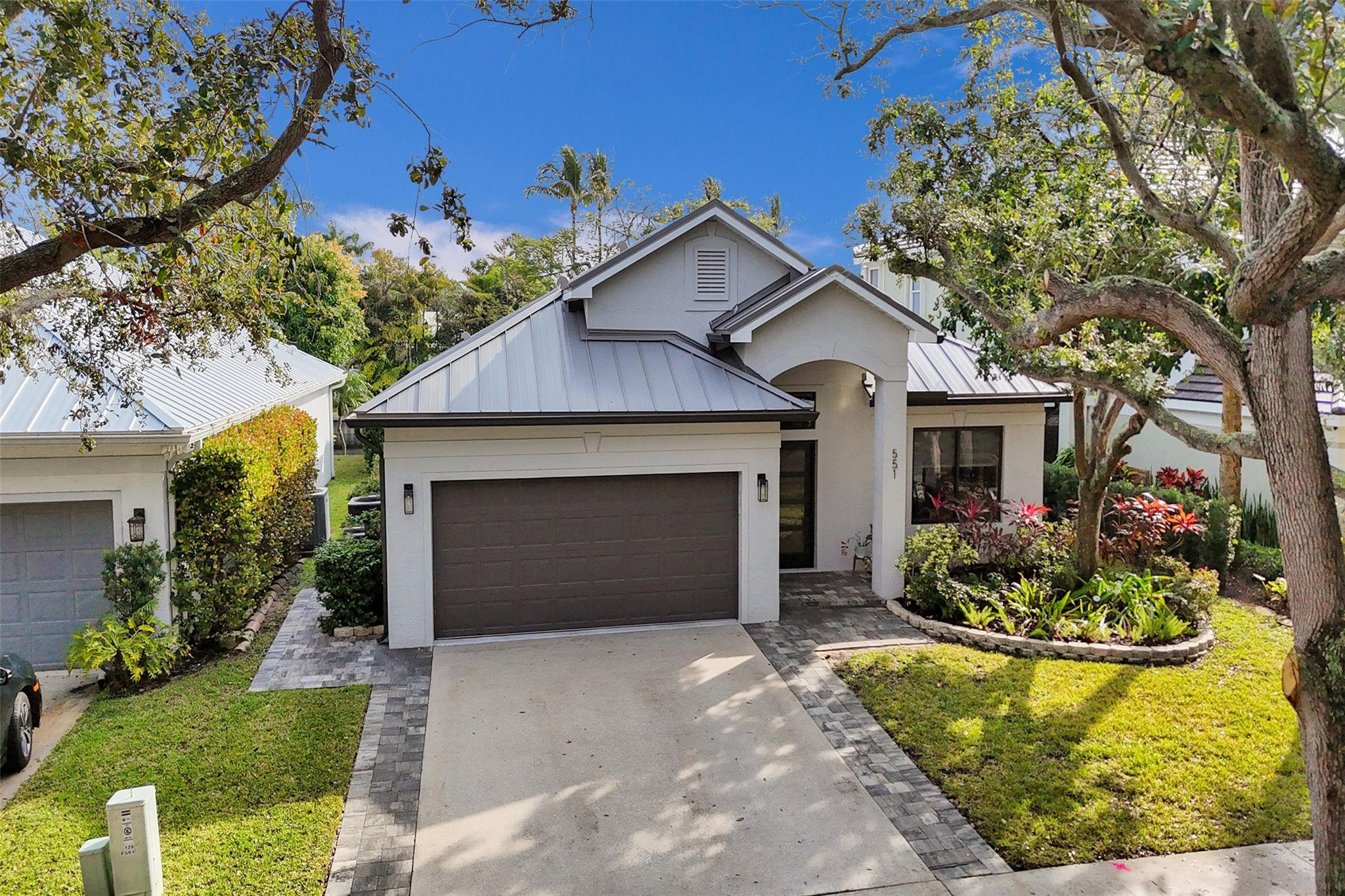 551 Anchor Point Delray Beach, FL 33444 - Photo 1 of 46 a front view of a house with yard