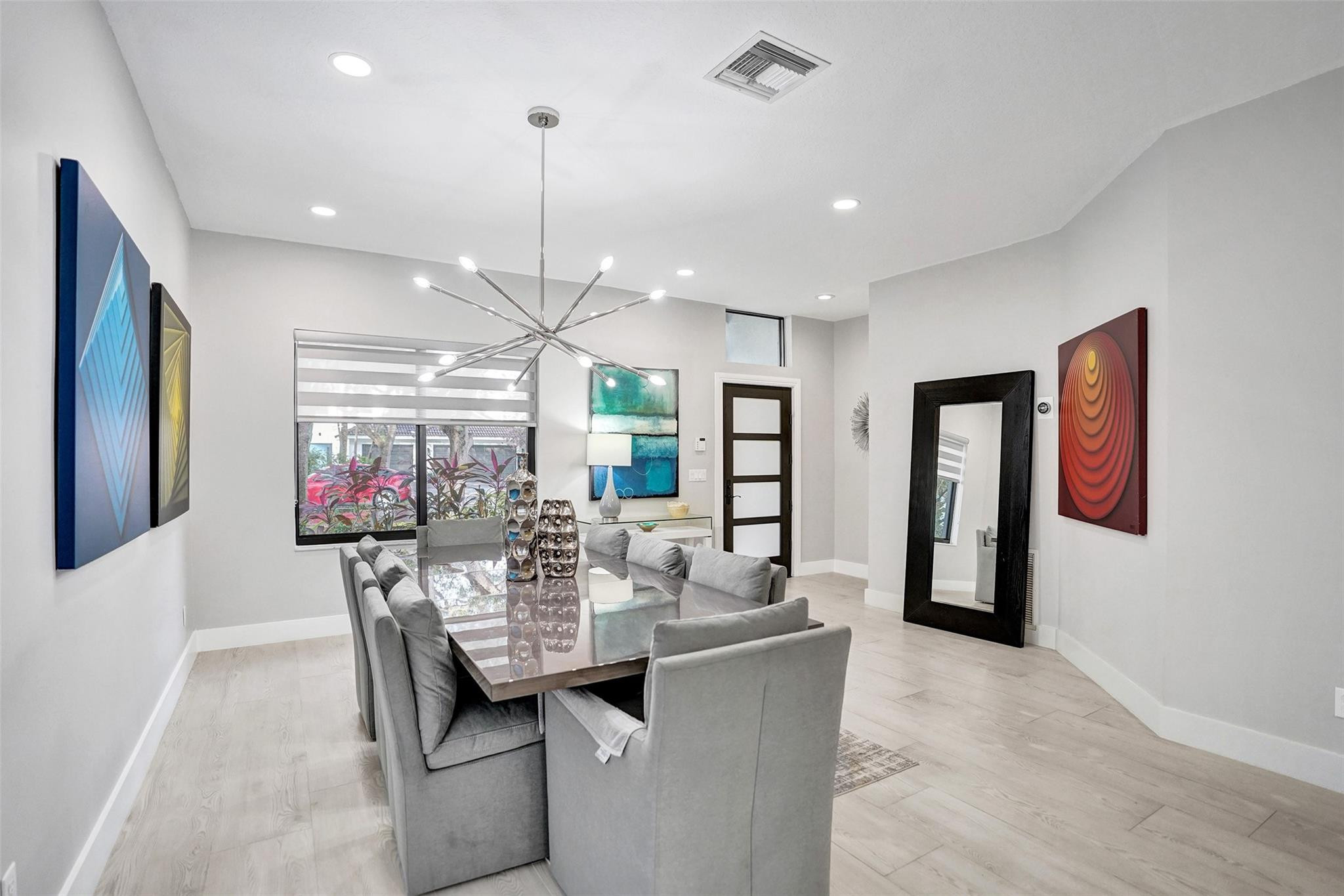 551 Anchor Point Delray Beach, FL 33444 - Photo 13 of 46 a view of a dining room with furniture and chandelier