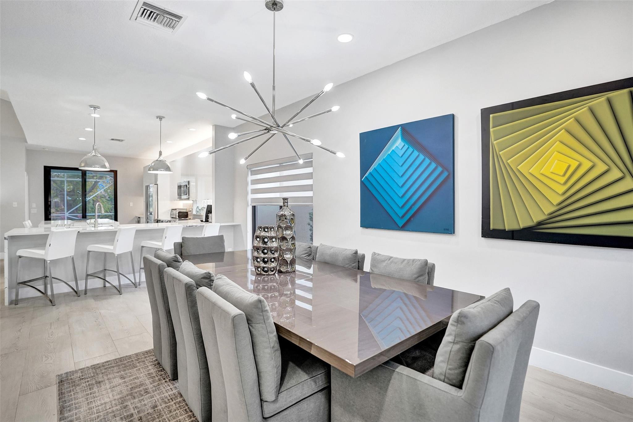 551 Anchor Point Delray Beach, FL 33444 - Photo 14 of 46 a view of a dining room with furniture