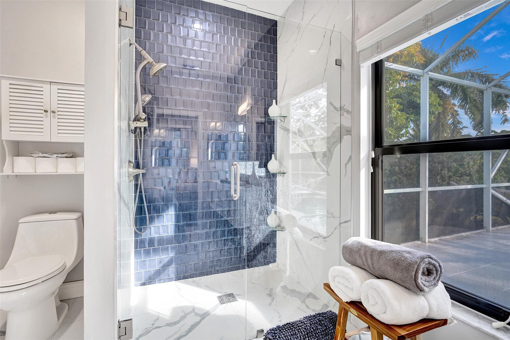 551 Anchor Point Delray Beach, FL 33444 - Photo 35 of 46 a bathroom with a toilet tub and shower
