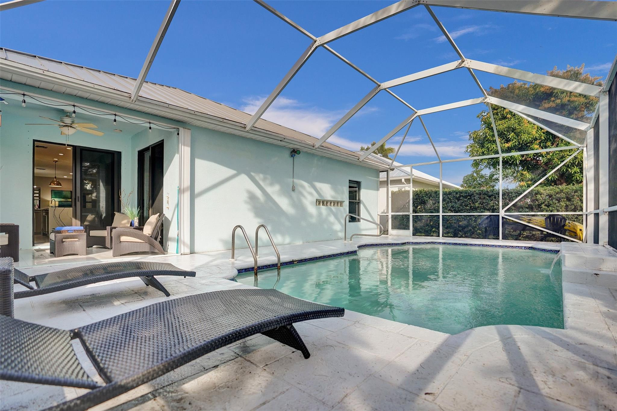 551 Anchor Point Delray Beach, FL 33444 - Photo 42 of 46 a view of a backyard with a swimming pool