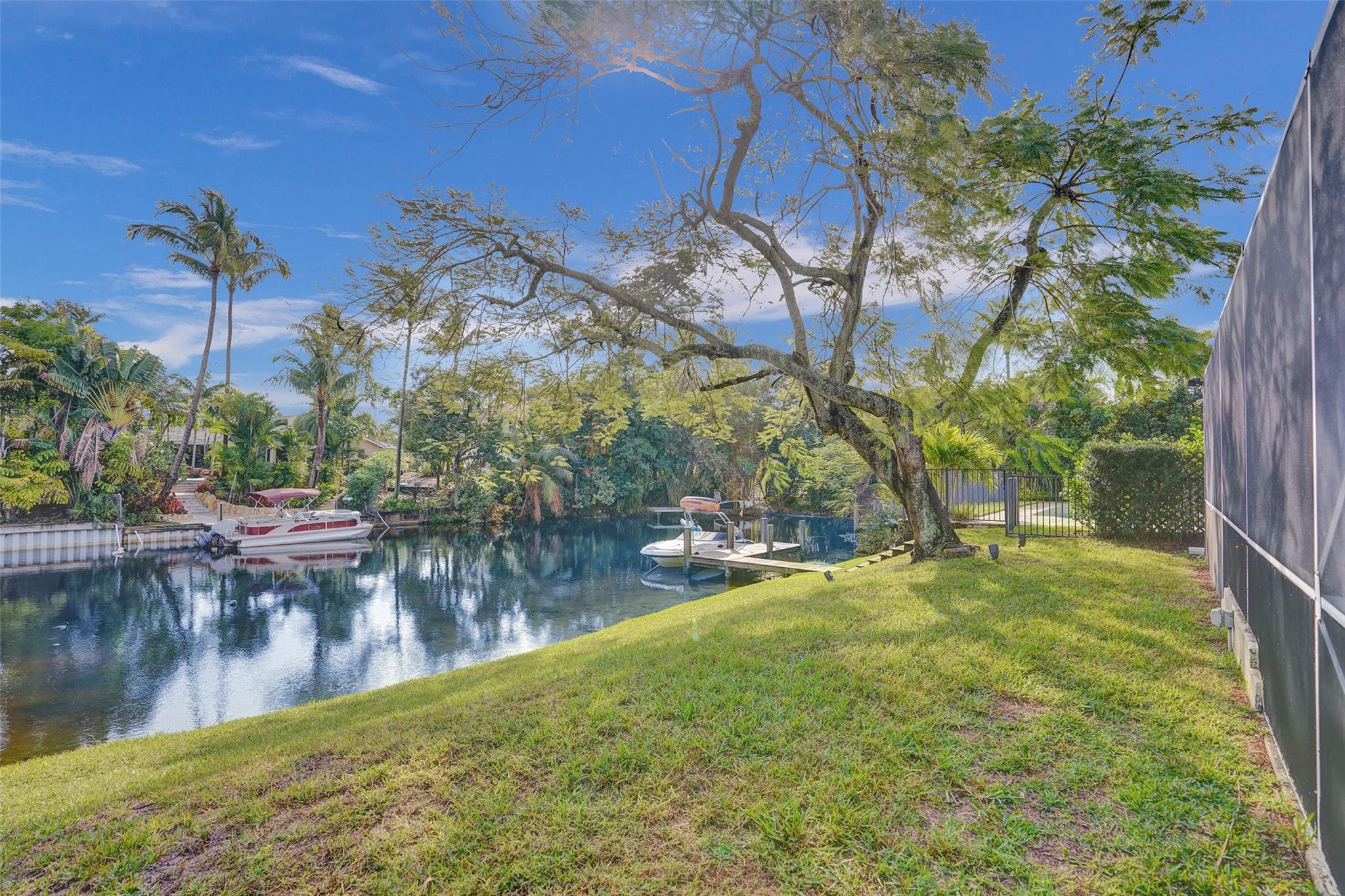 551 Anchor Point Delray Beach, FL 33444 - Photo 43 of 46 a view of swimming pool from a yard