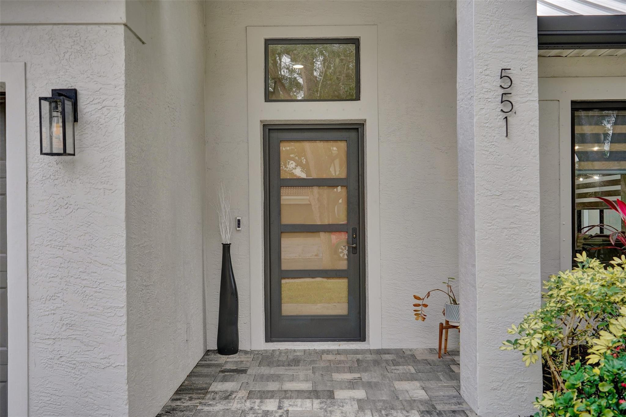 551 Anchor Point Delray Beach, FL 33444 - Photo 9 of 46 a view of an entryway with wooden floor