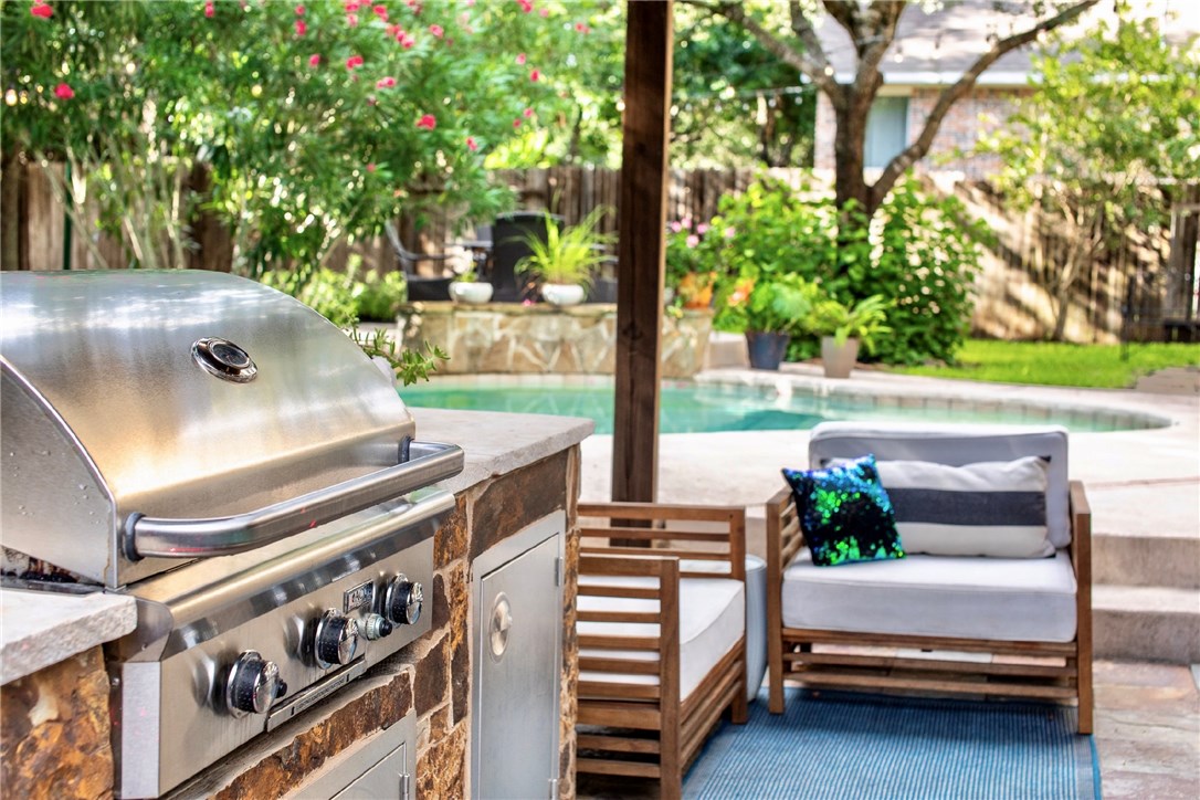 1719 Nelson Ranch Loop Cedar Park, TX 78613 - Photo 1 of 1 Oasis backyard, complete with covered patio, built in grill, fridge and adult beverage tap. Perfect for family get togethers and friendly gatherings. Perfect pool for staying cool in the summer!