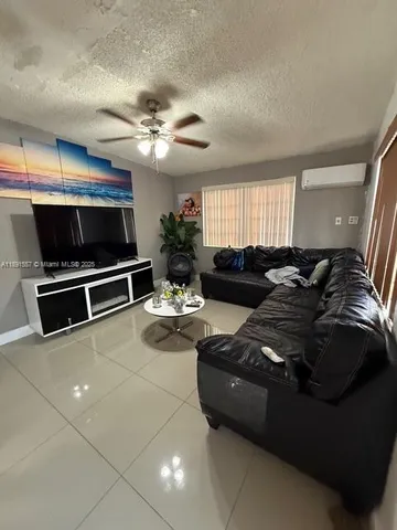 a view of kitchen with stainless steel appliances cabinets and a counter top oven
