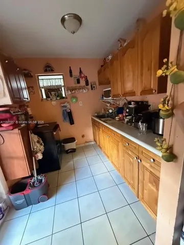a kitchen with lots of appliances