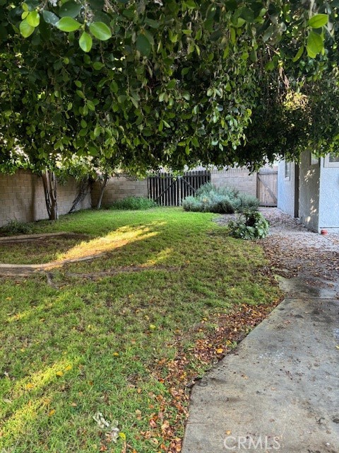 6314 Friends Avenue Whittier, CA 90601 - Photo 11 of 12 a view of a backyard with large trees