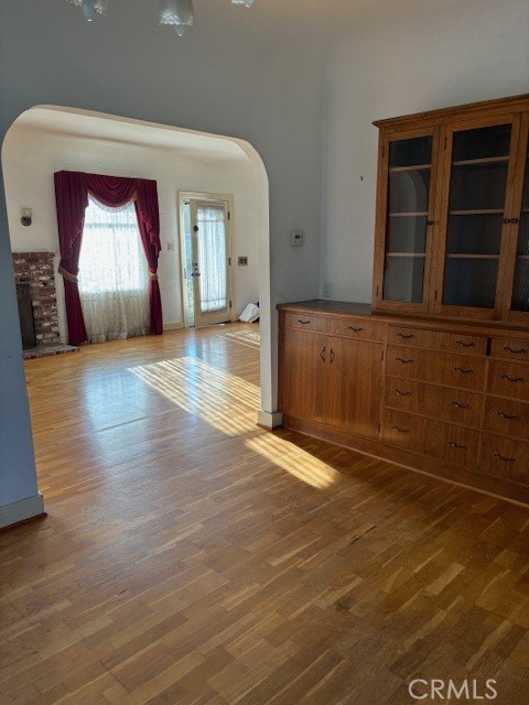 6314 Friends Avenue Whittier, CA 90601 - Photo 3 of 12 a view of empty room with wooden floor