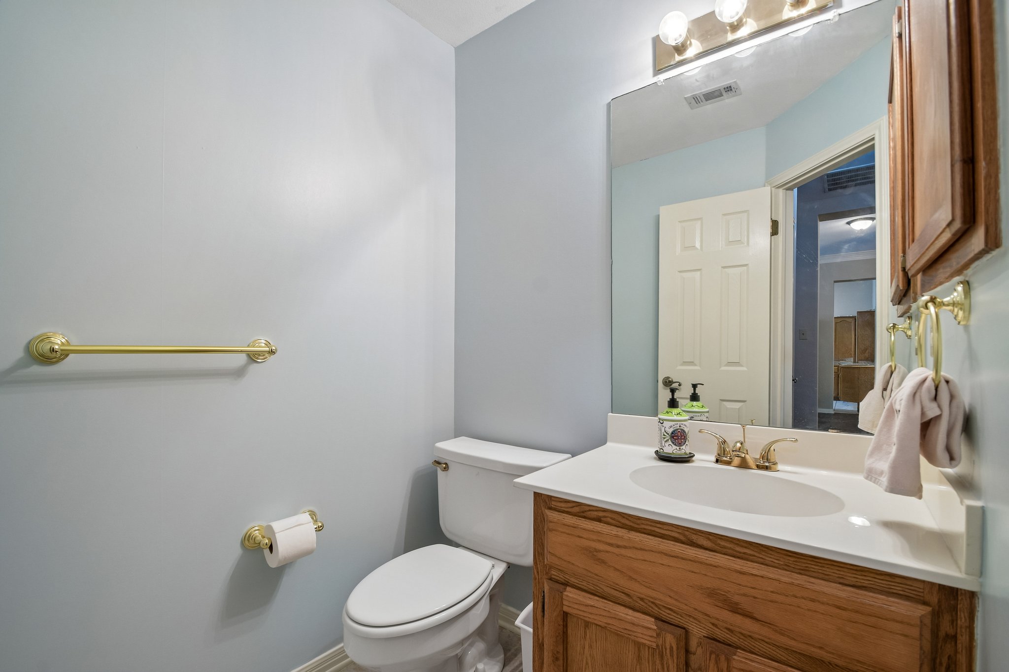 3902 Denim Trail Austin, TX 78739 - Photo 21 of 40 Half Bath off hallway near living area