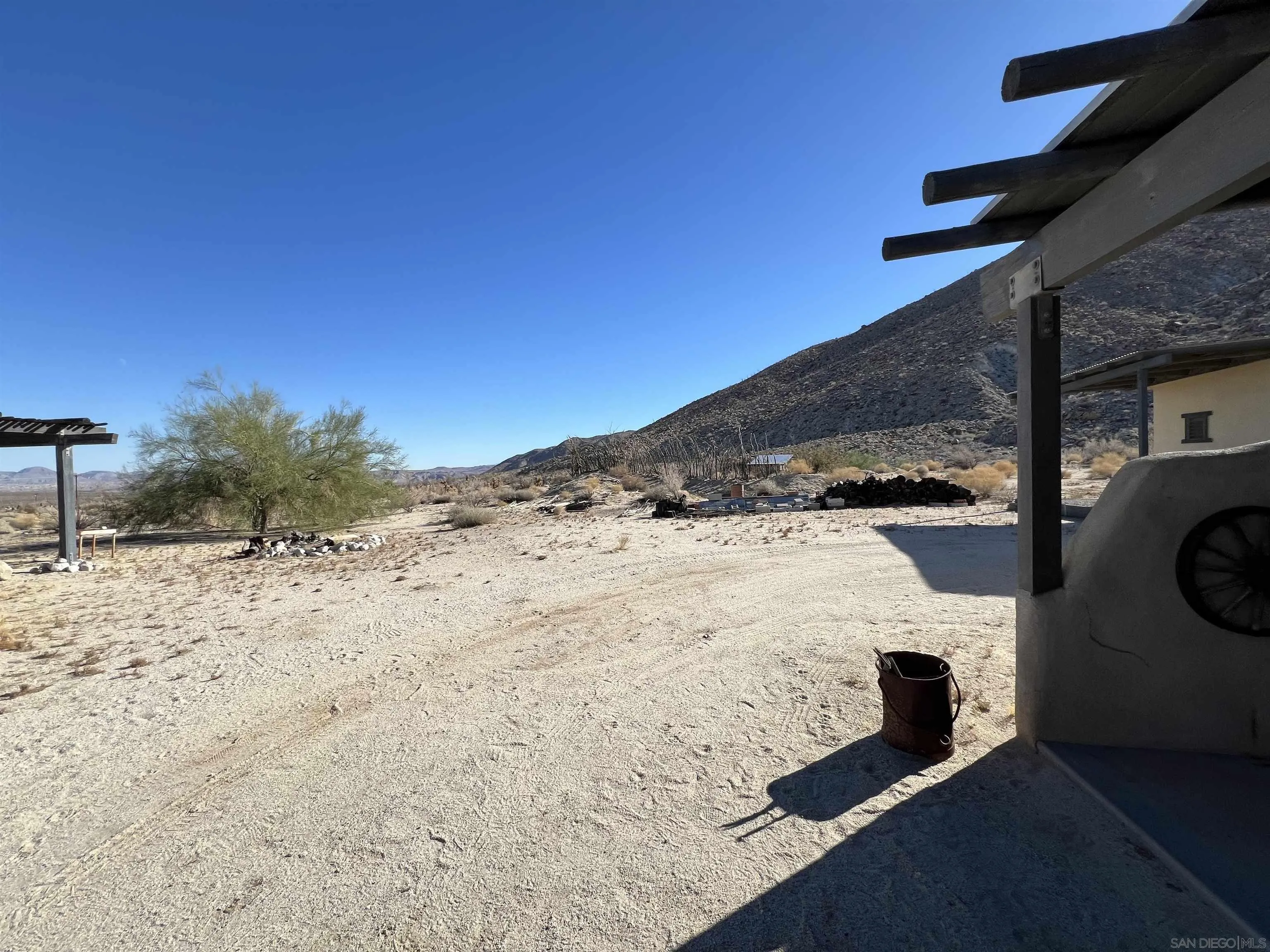 255 Canyon Road Julian, CA 92036 - Photo 19 of 34 a view of a dry yard with trees